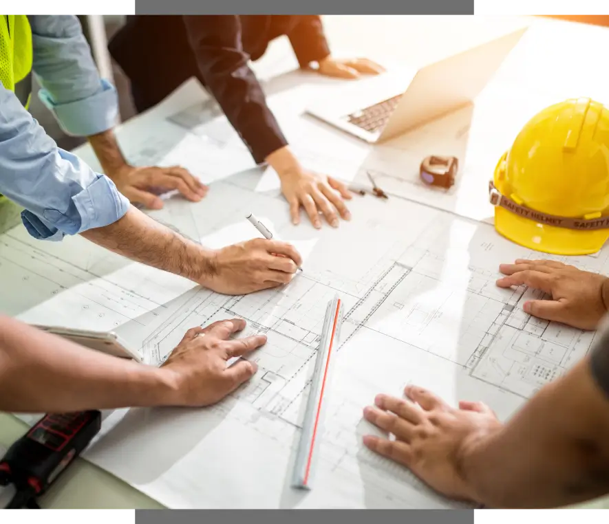 Construction team discussing building plans