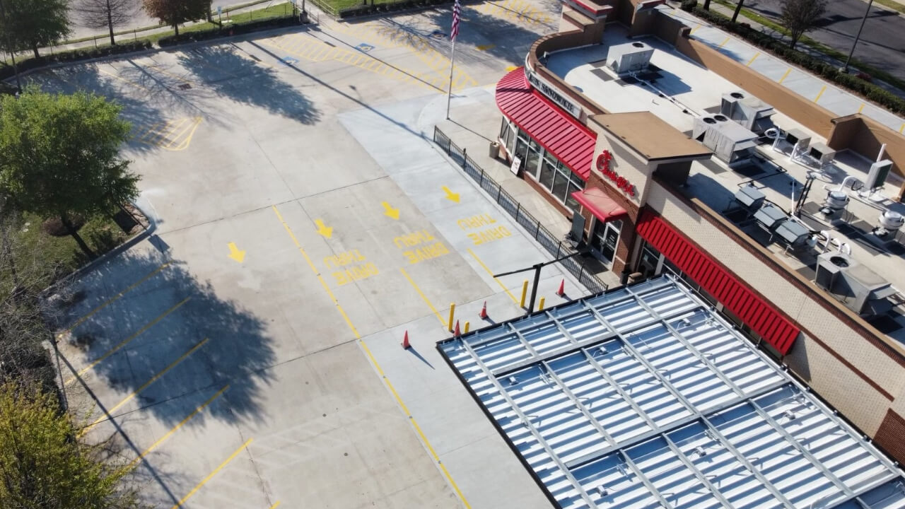 Empty drive-thru area with building overhead view.